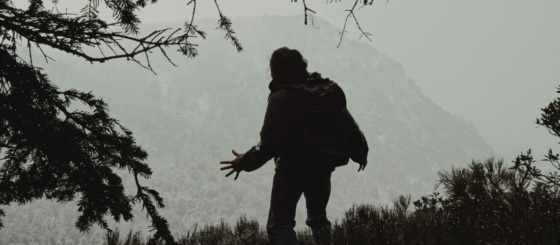 man hiking in the wilderness